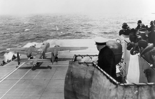 One of the Doolittle Raiders takes off from the Hornet. Pilots followed lines painted on the deck to avoid striking the carrier’s island with the bomber’s wing. (US Navy)